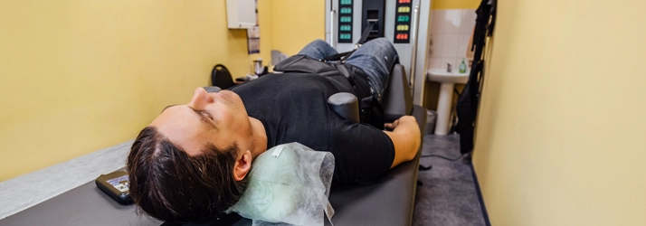 Man In Spinal Decompression Machine