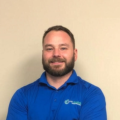 Chiropractor Devin Beach In Blue Polo